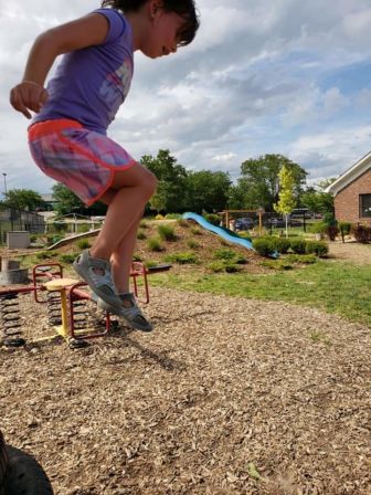 A child jumps off of a height