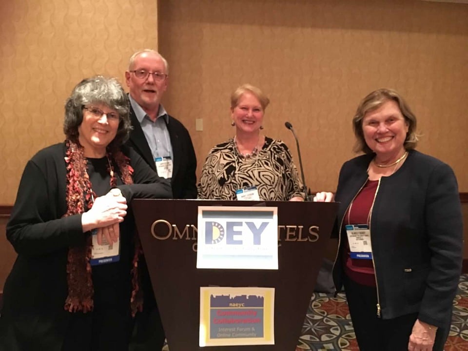 Blakely Bundy, Dr. Diane Levin, Dr. Marcy Guddemi, and James St. Clair stand next to a podium