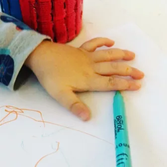 hand 2 tracing around young child's hand