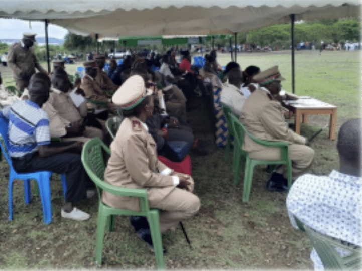 View of adults seated under a tent attending Hope School's Community Event to Sensitize School Heads, Teachers, Parents, Educational and Security Stakeholders on the Importance of Play in holistic growth of the Child.